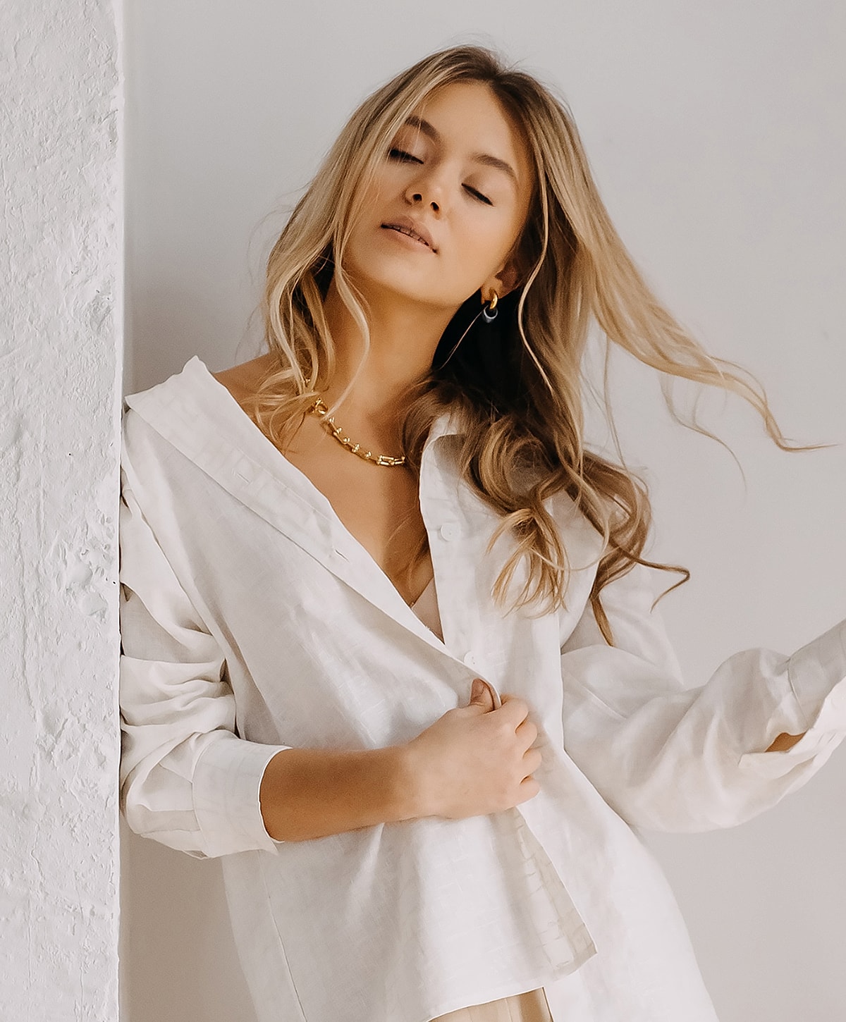 Client receiving facial treatment at beauty clinic.