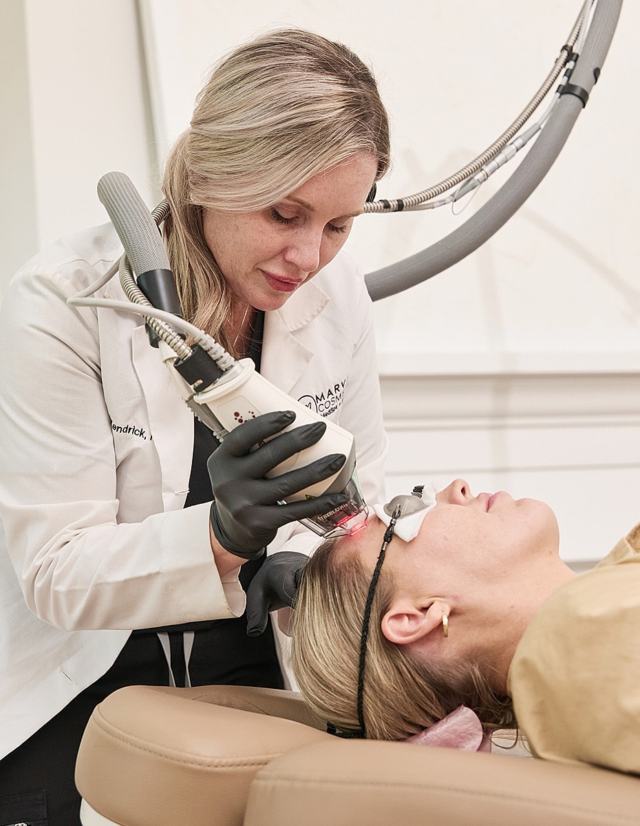 Skin treatment session with laser equipment in clinic