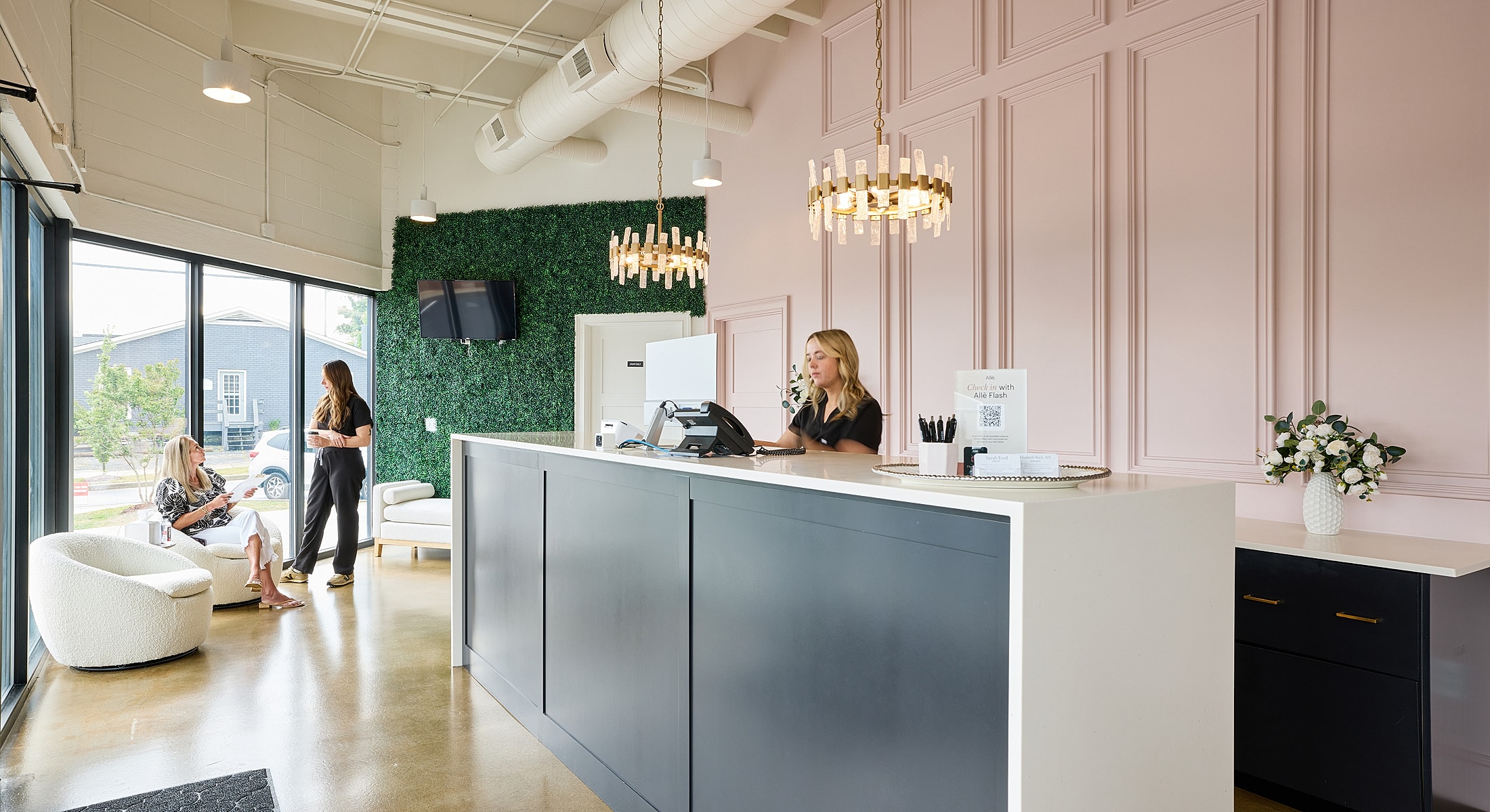 Modern reception area with stylish décor and seating.