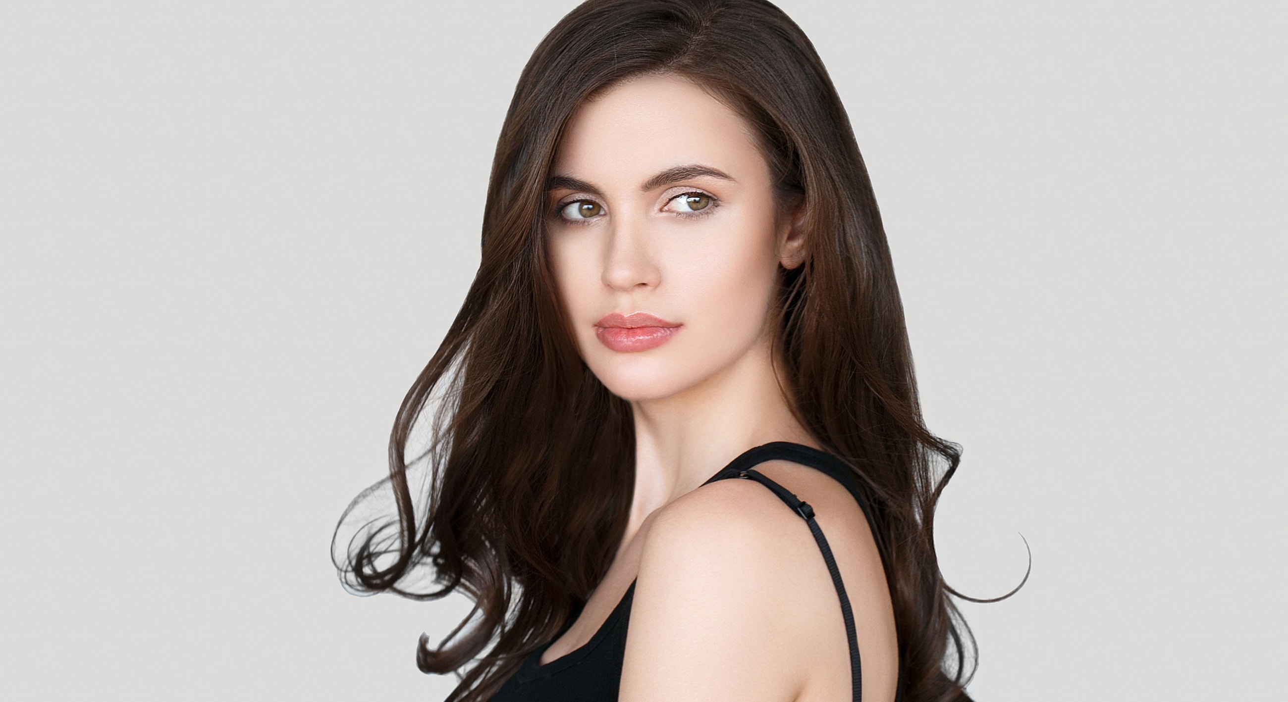 Portrait of a woman with flowing hair.