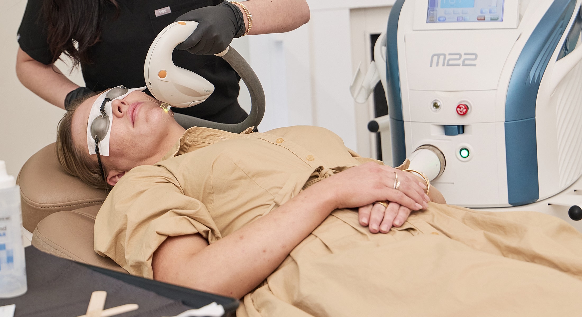Laser treatment session in medical spa setting.